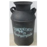 Vintage milk can. Measures 24" tall. Note: No