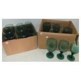 (18) Green glass stemmed water glasses. Largest