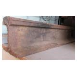 Iron rail. Measures 5.5" h x 24" w x 5.25" d.