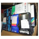 Large box full of VHS tapes.