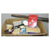 Coffee mugs, stapler, hanging file folders and