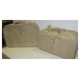 Pair of vintage leather suitcases.