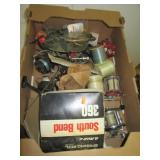Various fishing items including reels, line,