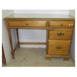Wood desk with five drawers. Measures 30" h x