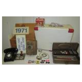 Vintage metal fishing box with some contents,