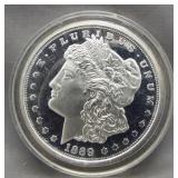 1889 Morgan silver dollar copy coin.