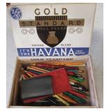 Vintage Gold Standard cigar box filled with a