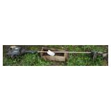 Bushwhacker straight shaft gas weed whip. Pulls
