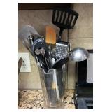 Pitcher full of Kitchen Utensils