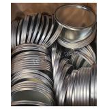 Box of Metal Paint Can Lids