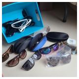 Assorted Pairs of Sunglasses Assorted Pairs of Sunglasses