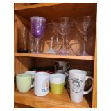 Mugs and plastic cocktail glasses