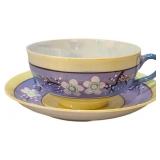 Iridescent teacup and saucer
