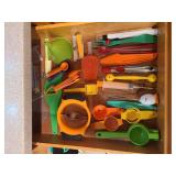Drawer of colorful kitchen needs