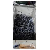 Container Full Of Power Supply Cords