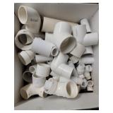 Box of PVC L Joints and Pipe Pieces