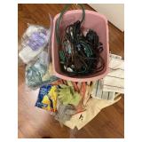 Box extension cords gloves kitchen rags