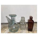 Small Glass Bottles and Book on Bottles