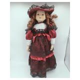 Porcelain Doll with Red Dress