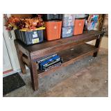 Solid wood workbench 8 foot by 3 foot by 3 foot.