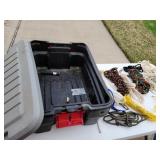 Rubbermaid tote full of rope.