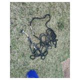 Two black 25 ft hoses that can connect together
