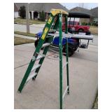 Six foot tall a frame ladder with bucket