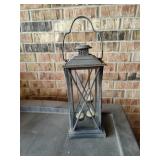 Tall metal hanging lantern with three battery