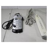 2 power strips surge  protectors. One is an APC