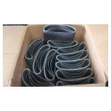 A box with 40 sanding belts inside of it.BELT