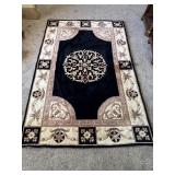 58"x88.5" Black & Cream Floral Rug