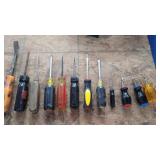 A bunch of screwdrivers different sizes