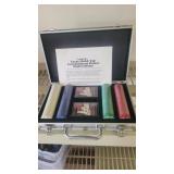 A Texas holdem chip and card set in a nice case
