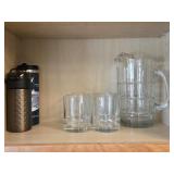 Glass Pitcher w/4 Matching Glasses & 2 Travel Mugs