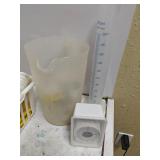 Scale, graduated cylinder, twine