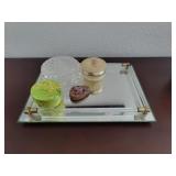 Vanity table mirror with small decorative Jars