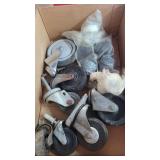 Crate full of miscellaneous casters