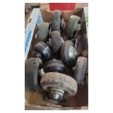 Crate full of ten miscellaneous casters