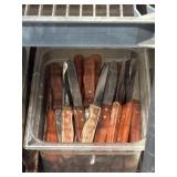 Container Filled With Knives