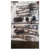 A lot of ratcheting tie down miscellaneous iyes