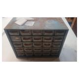 Container full of hardware
