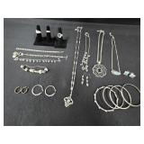 (4) Necklaces, (4) Stacking Bracelets,  (3)