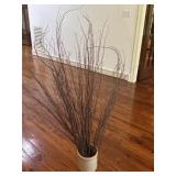 A vase with large bundle of dried decorative A vase with large bundle of dried decorative