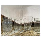 4 Assorted little jars no lids 4 Assorted little jars no lids