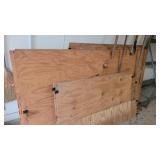 A.Bunch of plywood several full size sheets A.Bunch of plywood several full size sheets