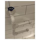 Custom made toilet paper holder constructed from