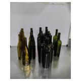 22 Empty Wine Bottles Of Assorted Colors And