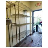 Large metal shelf racking on lockable wheels