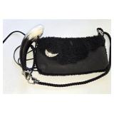 Black Sherpa Handbag with a Decorative Drinking