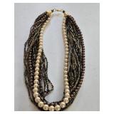 Multi-Strand Necklace Featuring Cream-colored